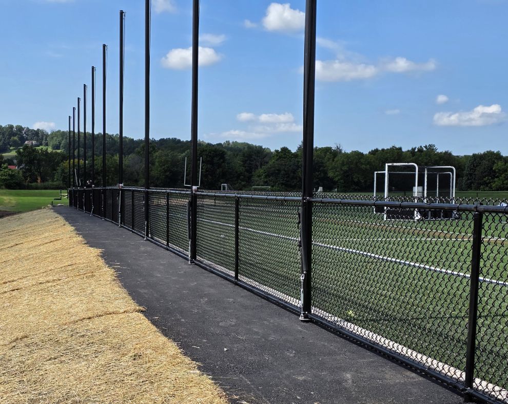 Fencing and netting around athletic fields